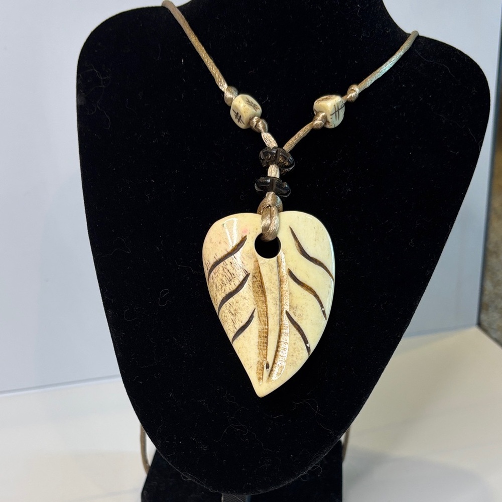 Carved Bone Cream and Brown Pendant Necklace